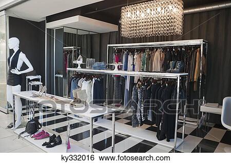 Interiors of a clothing store View Large Photo Image Stock Photograph - Interiors of a clothing store. Fotosearch