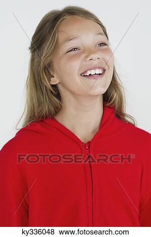 Close-up of a girl smiling View Large Photo Image Stock Photo - Close-up of a girl smiling. Fotosearch
