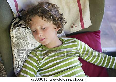 Cute little boy sleeping at home View Large Photo Image Stock Photography - Cute little boy sleeping at home. Fotosearch