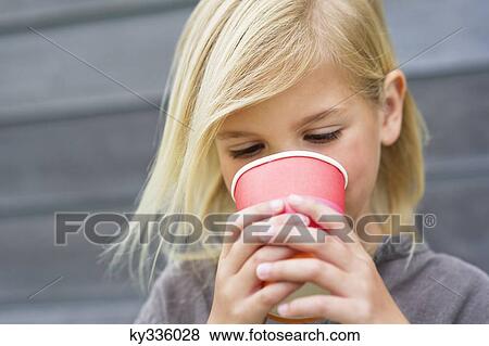Girl drinking coffee View Large Photo Image Stock Photo - Girl drinking coffee. Fotosearch