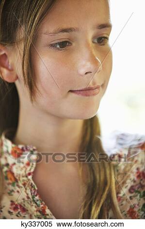 Close-up of a girl thinking View Large Photo Image Stock Photography - Close-up of a girl thinking. Fotosearch