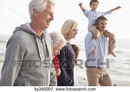 Family enjoying on the beach View Large Photo Image Stock Photo - Family enjoying on the beach. Fotosearch
