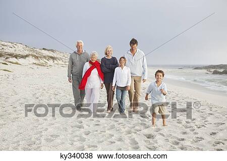 Family enjoying on the beach View Large Photo Image Stock Photo - Family enjoying on the beach. Fotosearch