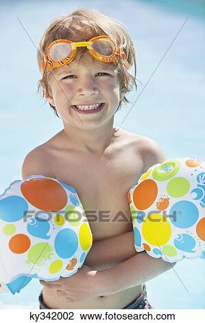 Close-up of a boy smiling View Large Photo Image Stock Image - Close-up of a boy smiling. Fotosearch