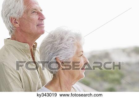 Close-up of a senior couple at a balcony View Large Photo Image Stock Photo - Close-up of a senior couple at a balcony. Fotosearch
