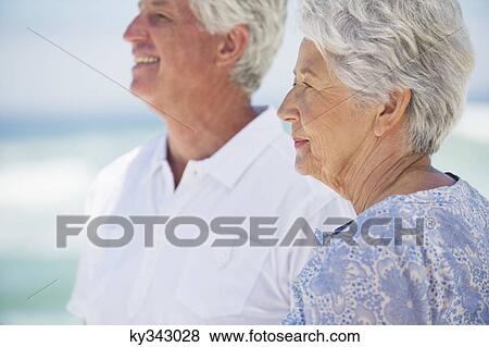 Senior couple on the beach View Large Photo Image Stock Photo - Senior couple on the beach. Fotosearch