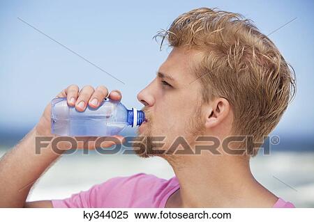 drinking a water bottle