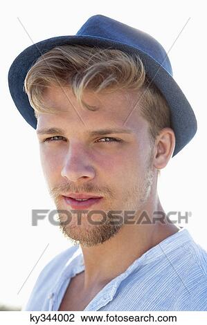 Portrait of a man wearing hat View Large Photo Image Stock Image - Portrait of a man wearing hat. Fotosearch