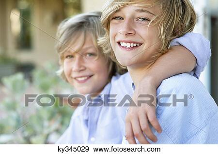Portrait of two little boys smiling View Large Photo Image Stock Photo - Portrait of two little boys smiling. Fotosearch