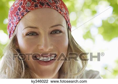 Portrait of a beautiful woman smiling View Large Photo Image Stock Image - Portrait of a beautiful woman smiling. Fotosearch