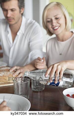 Couple having food View Large Photo Image Picture - Couple having food. Fotosearch