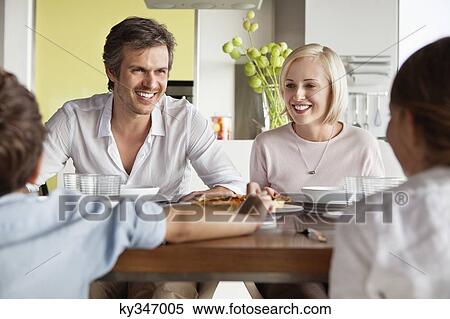 Family having food View Large Photo Image Stock Photography - Family having food. Fotosearch