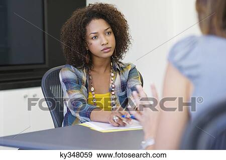 African American woman taking an interview of a woman View Large Photo Image Stock Photo - African American woman taking an interview of a woman. Fotosearch