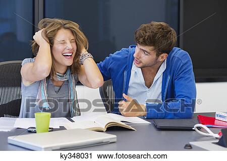 University student consoling his friend in a classroom View Large Photo Image Stock Image - University student consoling his friend in a classroom. Fotosearch