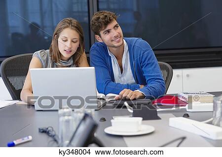 University students using laptop in classroom View Large Photo Image Picture - University students using laptop in classroom. Fotosearch