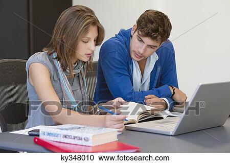 University students using laptop in classroom View Large Photo Image Stock Image - University students using laptop in classroom. Fotosearch