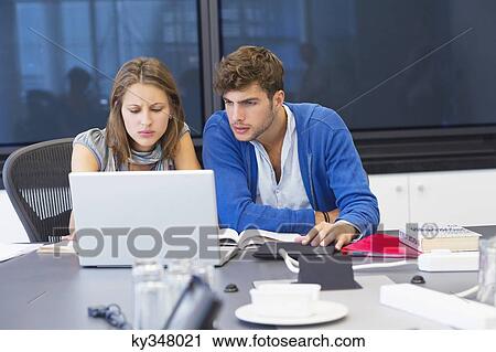 University students using laptop in classroom View Large Photo Image Stock Image - University students using laptop in classroom. Fotosearch