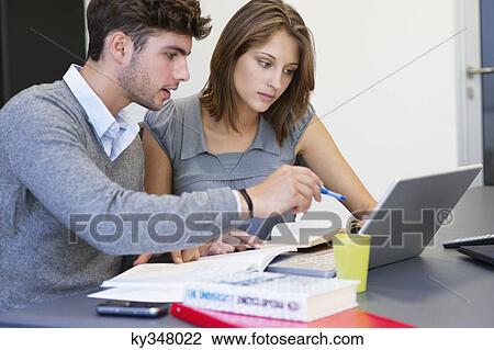 University students using laptop in classroom View Large Photo Image Stock Image - University students using laptop in classroom. Fotosearch