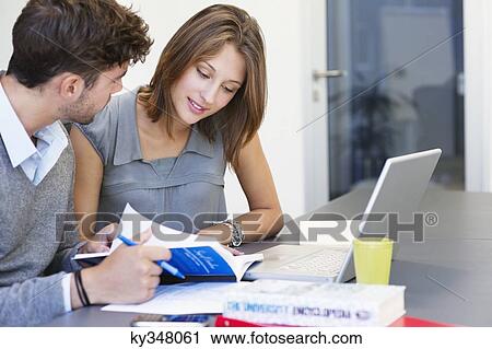 University students using laptop in classroom View Large Photo Image Stock Image - University students using laptop in classroom. Fotosearch
