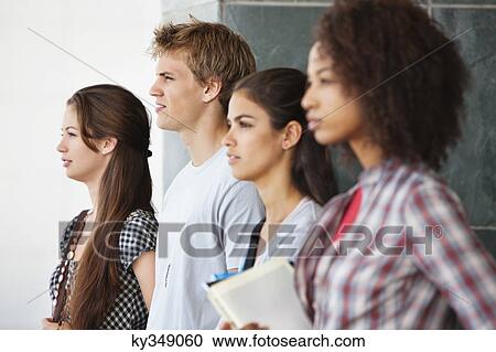 Close-up of university students standing together View Large Photo Image Stock Image - Close-up of university students standing together. Fotosearch
