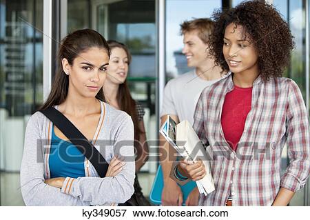 Friends in campus View Large Photo Image Stock Photo - Friends in campus. Fotosearch