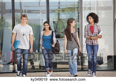 University students walking in a campus View Large Photo Image Stock Photo - University students walking in a campus. Fotosearch