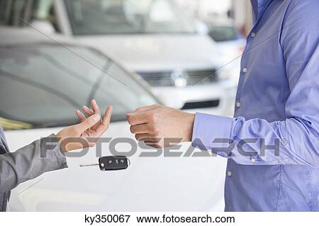 Car key falling down View Large Photo Image Stock Photo - Car key falling down. Fotosearch