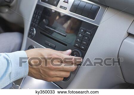 Man increasing the music volume View Large Photo Image Stock Image - Man increasing the music volume. Fotosearch