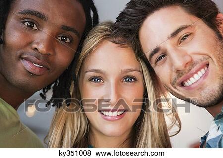 Portrait of friends enjoying in a bar View Large Photo Image Stock Photo - Portrait of friends enjoying in a bar. Fotosearch