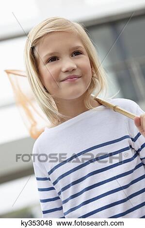 Cute girl looking away View Large Photo Image Stock Photo - Cute girl looking away. Fotosearch