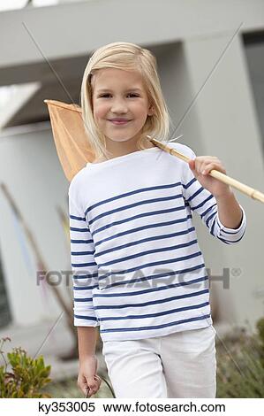 Portrait of a girl carrying net on her shoulder View Large Photo Image Stock Photography - Portrait of a girl carrying net on her shoulder. Fotosearch