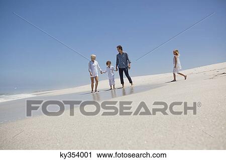 Family enjoying on the beach View Large Photo Image Stock Image - Family enjoying on the beach. Fotosearch