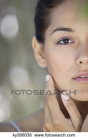 Stock Photography - Portrait of a beautiful young woman. Fotosearch