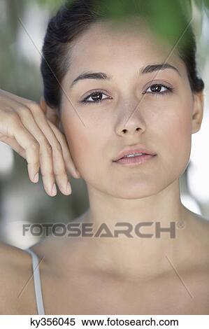Portrait of a beautiful young woman View Large Photo Image Stock Photography - Portrait of a beautiful young woman. Fotosearch