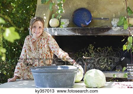 Portrait of a little girl with cabbage on table outdoors View Large Photo Image Stock Image - Portrait of a little girl with cabbage on table outdoors. Fotosearch
