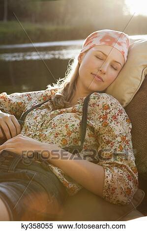 Beautiful woman sleeping in the boat View Large Photo Image Stock Photography - Beautiful woman sleeping in the boat. Fotosearch