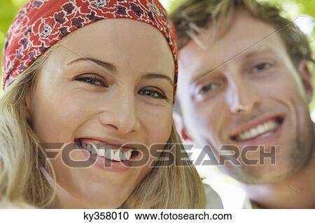 Close-up of a cheerful husband and wife View Large Photo Image Stock Image - Close-up of a cheerful husband and wife. Fotosearch