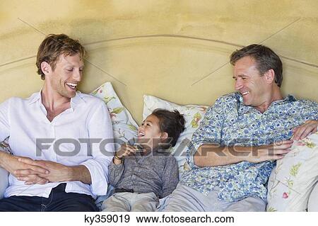 Family having good time at house View Large Photo Image Stock Photo - Family having good time at house. Fotosearch