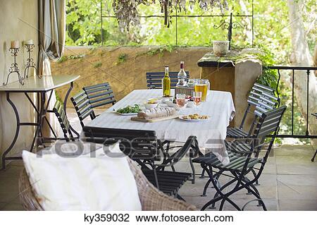 Food on table in porch View Large Photo Image Stock Image - Food on table in porch. Fotosearch