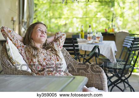 Little girl looking away with food on table in the background View Large Photo Image Stock Photography - Little girl looking away with food on table in the background. Fotosearch