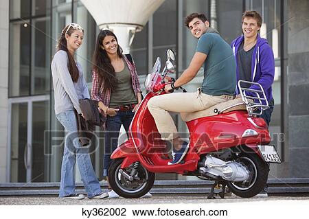 Friends having a conversation View Large Photo Image Stock Image - Friends having a conversation. Fotosearch