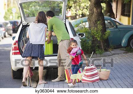 Picture - Family going on vacations. Fotosearch