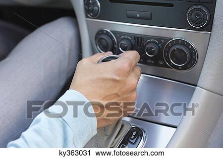 Man shifting automatic car gear View Large Photo Image Stock Image - Man shifting automatic car gear. Fotosearch