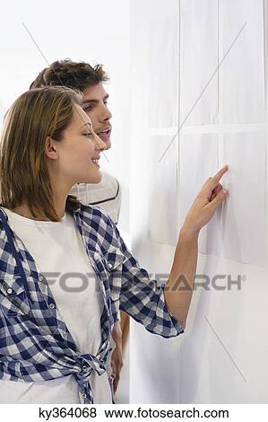 University students checking bulletin board for test result View Large Photo Image Stock Photo - University students checking bulletin board for test result. Fotosearch
