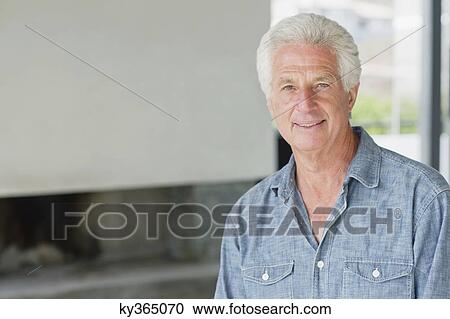 Portrait of a senior man smiling View Large Photo Image Stock Image - Portrait of a senior man smiling. Fotosearch