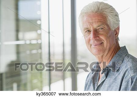 Stock Photo - Portrait of a senior man smiling. Fotosearch