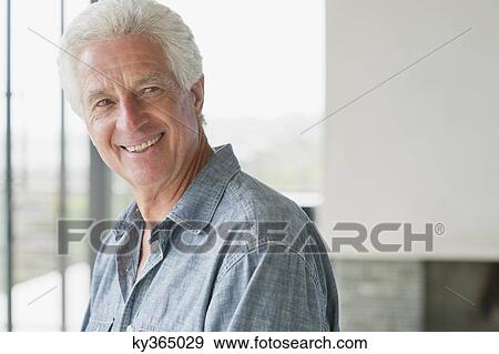 Portrait of a senior man smiling View Large Photo Image Stock Photo - Portrait of a senior man smiling. Fotosearch