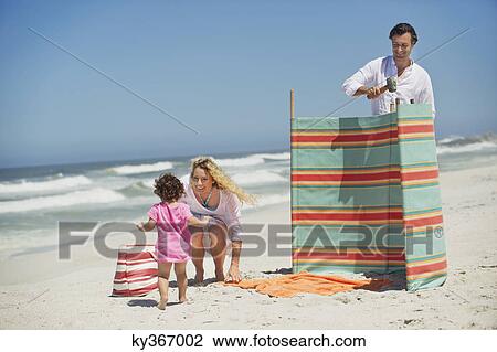 Family on the beach View Large Photo Image Stock Image - Family on the beach. Fotosearch