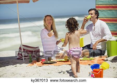 Family on the beach View Large Photo Image Stock Image - Family on the beach. Fotosearch