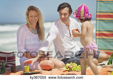 Happy family on the beach View Large Photo Image Stock Photography - Happy family on the beach. Fotosearch